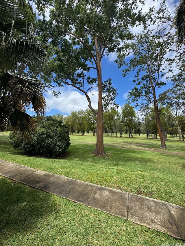 95-146 Kuahelani Ave Unit 131, Mililani, HI 96789 - view of property's community with a yard
