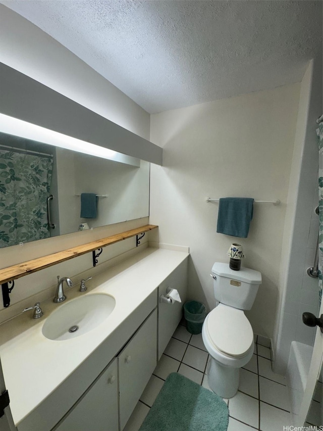 95-146 Kuahelani Ave Unit 131, Mililani, HI 96789 - bathroom featuring vanity, a textured ceiling, and tile patterned flooring
