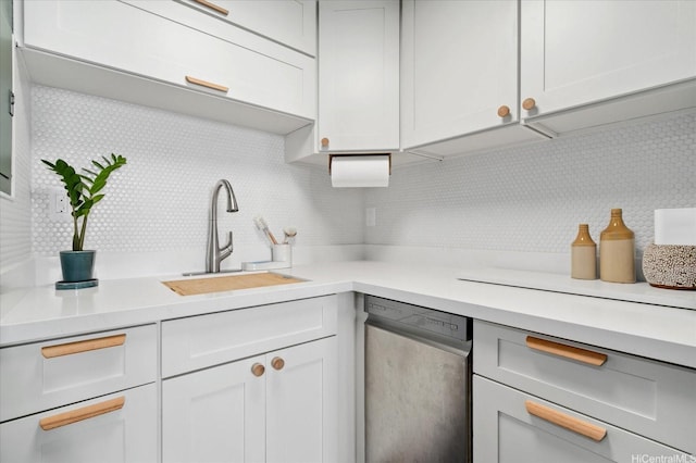 51-636 Kamehameha Hwy Unit 323, Kaaawa, HI 96730 - kitchen with stainless steel dishwasher, a sink, backsplash, and light countertops
