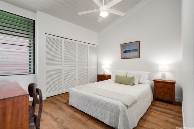 51-636 Kamehameha Hwy Unit 323, Kaaawa, HI 96730 - bedroom featuring vaulted ceiling, wood finished floors, a closet, and baseboards