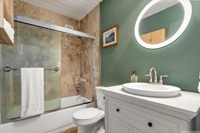 51-636 Kamehameha Hwy Unit 323, Kaaawa, HI 96730 - full bath featuring toilet, shower / bath combination with glass door, and vanity