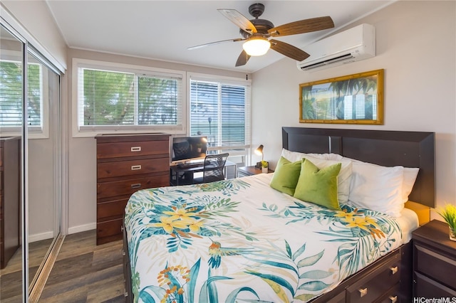 53-797 Kamehameha Hwy, Hauula, HI 96717 - bedroom featuring dark wood-style floors, an AC wall unit, a closet, baseboards, and ceiling fan
