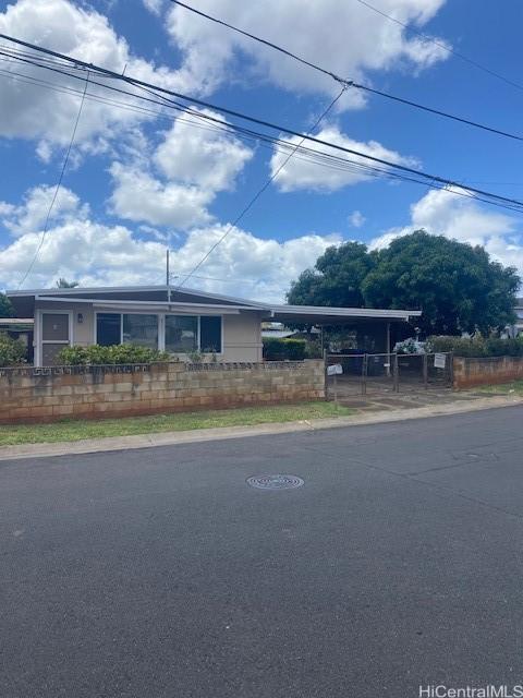 94-549 Pilimai St, Waipahu, HI 96797 - single story home with fence and an attached carport