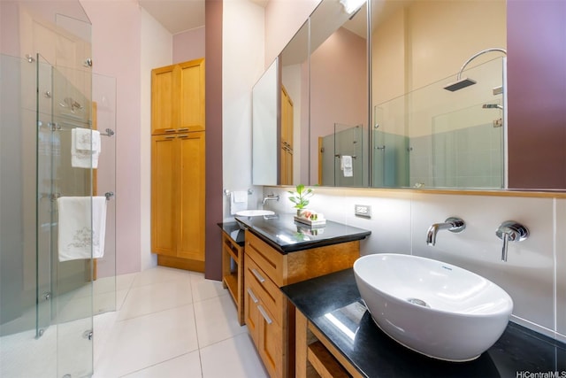 427 Launiu St Unit 603, Honolulu, HI 96815 - full bath featuring a stall shower, double vanity, and tile patterned flooring