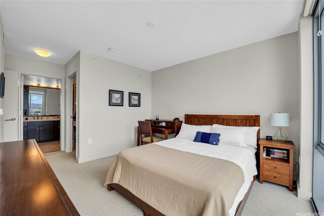 1189 Waimanu St Unit 1606, Honolulu, HI 96814 - bedroom with light carpet and connected bathroom