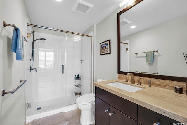 1189 Waimanu St Unit 1606, Honolulu, HI 96814 - full bathroom featuring vanity, a shower stall, tile patterned floors, and recessed lighting