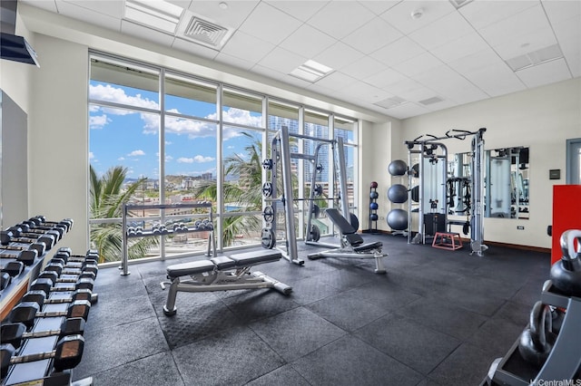 1189 Waimanu St Unit 1606, Honolulu, HI 96814 - exercise room with floor to ceiling windows and a paneled ceiling