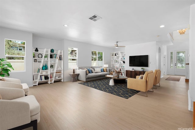 91-1023 Kaikoele St, Ewa Beach, HI 96706 - living area with light wood-style flooring, plenty of natural light, a ceiling fan, and recessed lighting