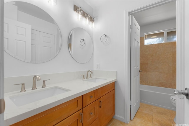 91-1023 Kaikoele St, Ewa Beach, HI 96706 - full bathroom with double vanity, toilet, tile patterned floors, and a tub