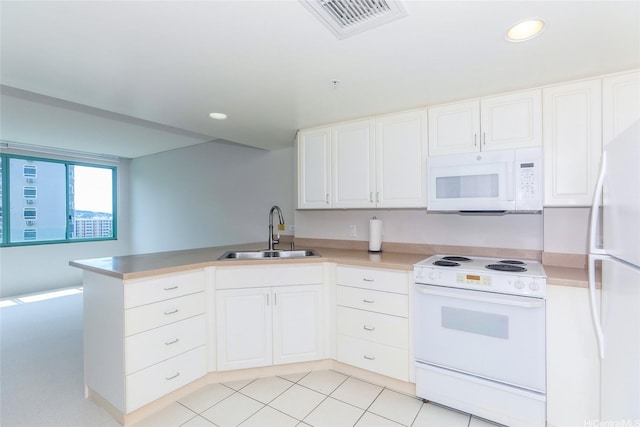 1314 Kalakaua Ave Unit 903, Honolulu, HI 96826 - kitchen featuring white appliances, a sink, a peninsula, white cabinetry, and recessed lighting