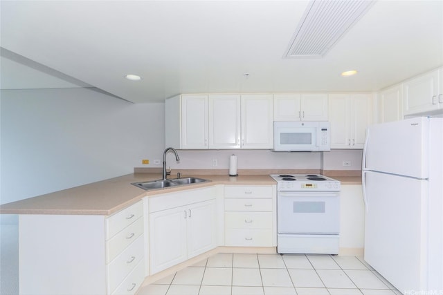 1314 Kalakaua Ave Unit 903, Honolulu, HI 96826 - kitchen with white appliances, a sink, a peninsula, white cabinetry, and recessed lighting
