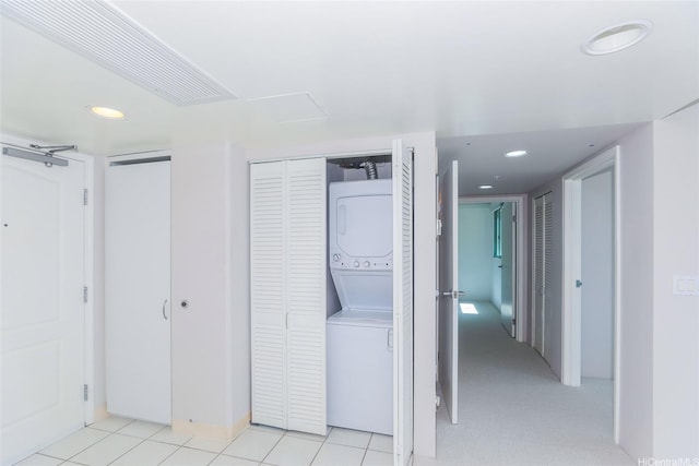 1314 Kalakaua Ave Unit 903, Honolulu, HI 96826 - washroom featuring stacked washer / dryer and recessed lighting