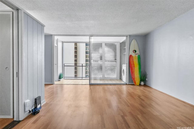 419A Atkinson Dr Unit 1203, Honolulu, HI 96814 - unfurnished room with wood finished floors and a textured ceiling