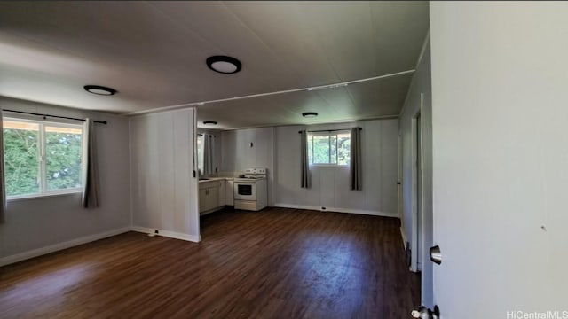 3904 Maunahilu Pl, Honolulu, HI 96816 - unfurnished living room featuring dark wood-type flooring and baseboards