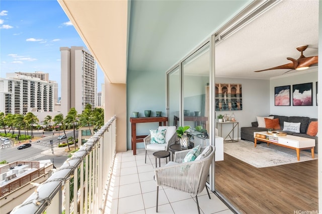 430 Keoniana St Unit 202, Honolulu, HI 96815 - balcony featuring a city view, outdoor lounge area, and a ceiling fan