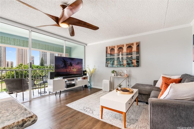 430 Keoniana St Unit 202, Honolulu, HI 96815 - living room with a textured ceiling, ornamental molding, ceiling fan, wood finished floors, and a view of city