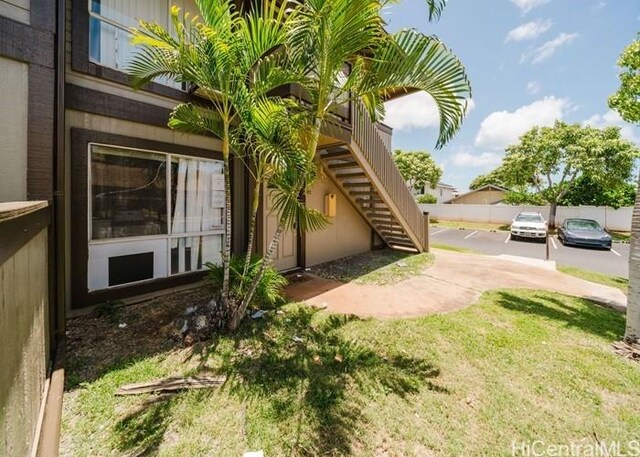91-1089 Puamaeole St Unit 15C, Ewa Beach, HI 96706 - view of side of property featuring stairway