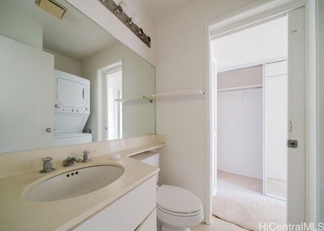 91-1089 Puamaeole St Unit 15C, Ewa Beach, HI 96706 - half bath featuring stacked washer / dryer, toilet, and vanity