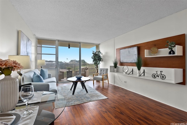 3161 Ala Ilima St Unit 1006, Honolulu, HI 96818 - living area with floor to ceiling windows, wood finished floors, and a textured ceiling