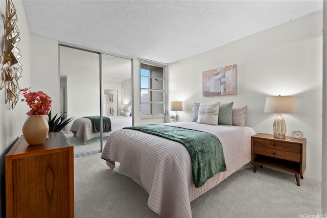 3161 Ala Ilima St Unit 1006, Honolulu, HI 96818 - carpeted bedroom featuring a closet and a textured ceiling