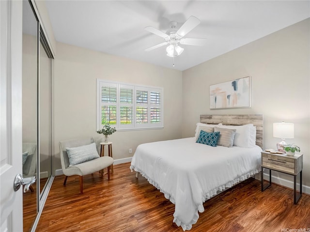 95-1073 Loea St, Honolulu, HI 96789 - bedroom featuring a closet, wood finished floors, baseboards, and a ceiling fan
