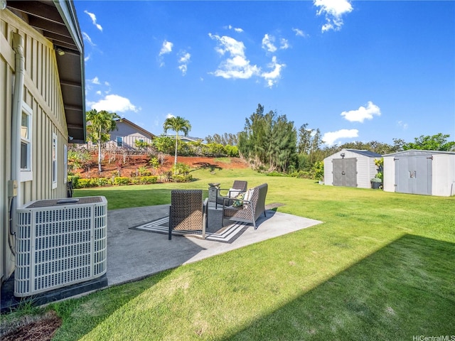 95-1073 Loea St, Honolulu, HI 96789 - view of grassy yard featuring central AC unit and a patio area