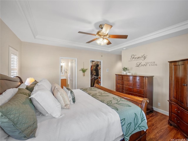 95-1073 Loea St, Honolulu, HI 96789 - bedroom featuring a raised ceiling, dark wood finished floors, a spacious closet, a closet, and ornamental molding