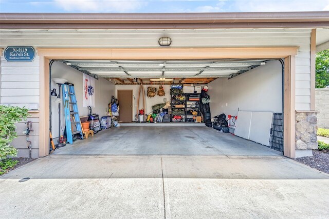 garage featuring driveway