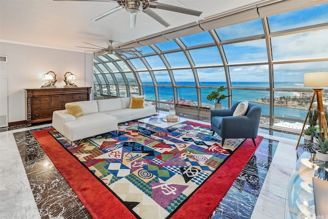 415 S St Unit 4202, Honolulu, HI 96813 - living room featuring ceiling fan, a sunroom, a water view, marble tiled flooring, and baseboards