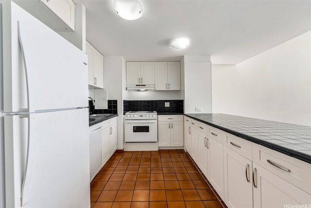 666 Prospect St Unit I506, Honolulu, HI 96813 - kitchen with white appliances, white cabinetry, under cabinet range hood, a sink, and backsplash