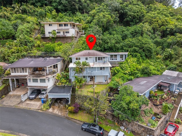 1681 Mahani Loop, Honolulu, HI 96819 - aerial view of property and surrounding area featuring a heavily wooded area