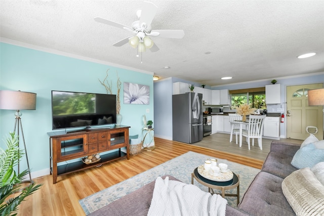 1681 Mahani Loop, Honolulu, HI 96819 - living area with a textured ceiling, light wood-style flooring, and ceiling fan