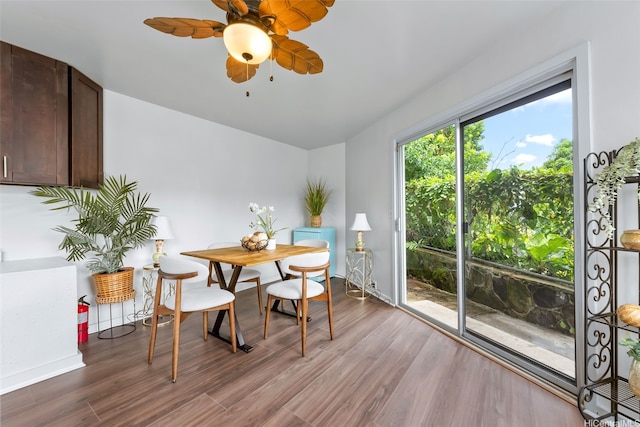 1681 Mahani Loop, Honolulu, HI 96819 - dining area with wood finished floors, a ceiling fan, and baseboards