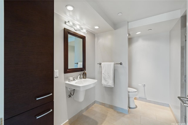 1837 Kalakaua Ave Unit 3106, Honolulu, HI 96815 - bathroom with toilet, tile patterned floors, baseboards, and recessed lighting