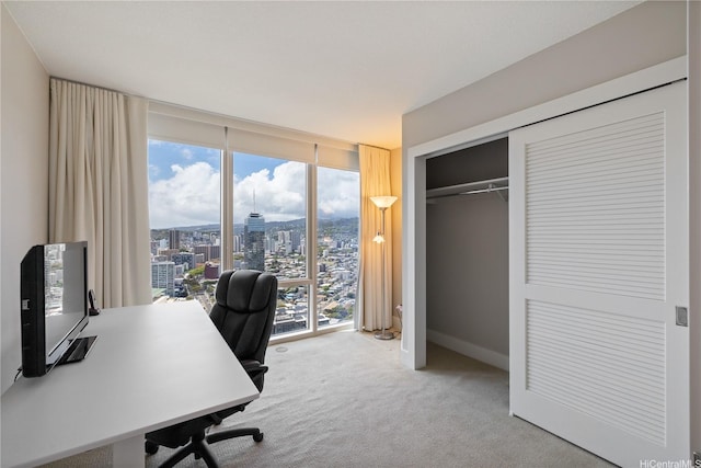 1837 Kalakaua Ave Unit 3106, Honolulu, HI 96815 - carpeted home office with expansive windows, a view of city, and baseboards