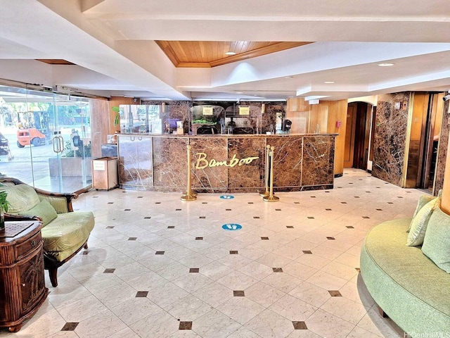 2425 Kuhio Ave Unit 410, Honolulu, HI 96815 - reception area featuring a dry bar, ornamental molding, and recessed lighting