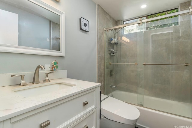 1492 Halekoa Dr, Honolulu, HI 96821 - bathroom with toilet, vanity, and bath / shower combo with glass door