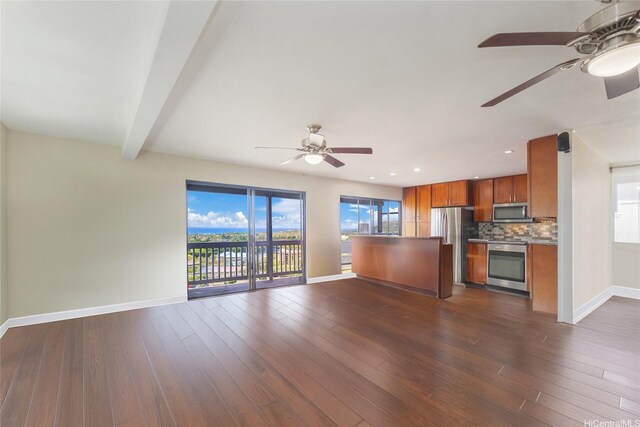 1492 Halekoa Dr, Honolulu, HI 96821 - kitchen with appliances with stainless steel finishes, a ceiling fan, open floor plan, baseboards, and brown cabinets