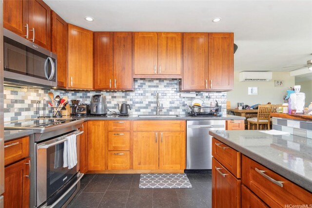 1492 Halekoa Dr, Honolulu, HI 96821 - kitchen featuring stainless steel appliances, a sink, a wall unit AC, decorative backsplash, and recessed lighting