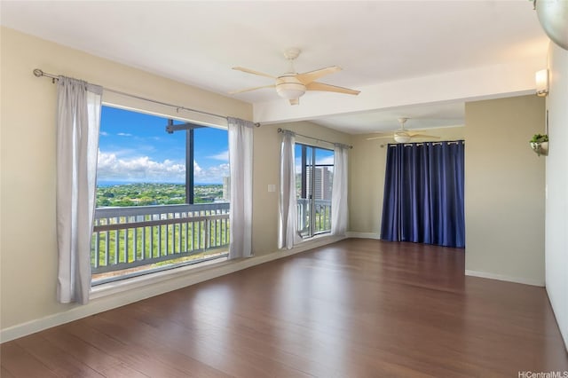 1492 Halekoa Dr, Honolulu, HI 96821 - spare room featuring a ceiling fan, wood finished floors, and baseboards