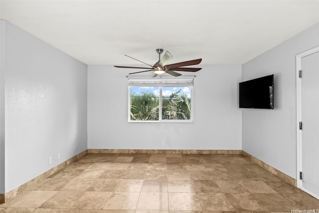 68-077 Au St Unit 3E, Waialua, HI 96791 - unfurnished room with baseboards, a ceiling fan, and stone finish flooring