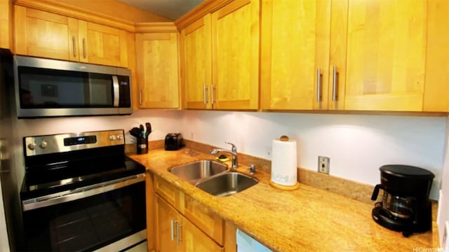 57-120 Lalo Kuilima Way Unit 2/17, Kahuku, HI 96731 - kitchen featuring stainless steel appliances, a sink, and light stone countertops
