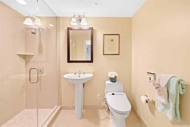 1551 Ala Wai Blvd Unit 1603, Honolulu, HI 96815 - bathroom with toilet, tile patterned floors, a shower stall, and baseboards
