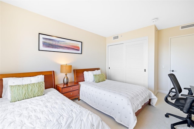 1551 Ala Wai Blvd Unit 1603, Honolulu, HI 96815 - bedroom featuring light colored carpet, a closet, and baseboards