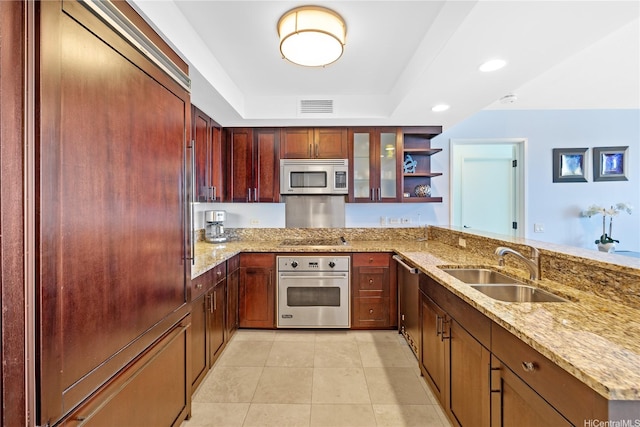 1551 Ala Wai Blvd Unit 1603, Honolulu, HI 96815 - kitchen with stainless steel appliances, a sink, a tray ceiling, open shelves, and light stone countertops