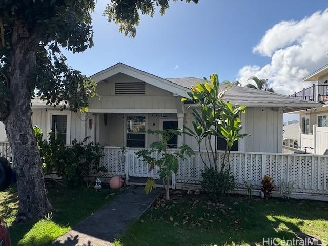 1704 Kamamalu Ave, Honolulu, HI 96813 - bungalow-style home with a porch and a front yard