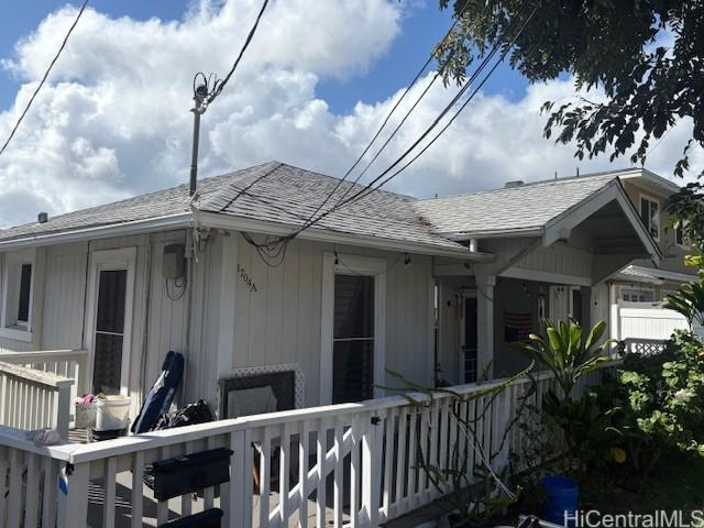 1704 Kamamalu Ave, Honolulu, HI 96813 - view of front of house featuring a shingled roof