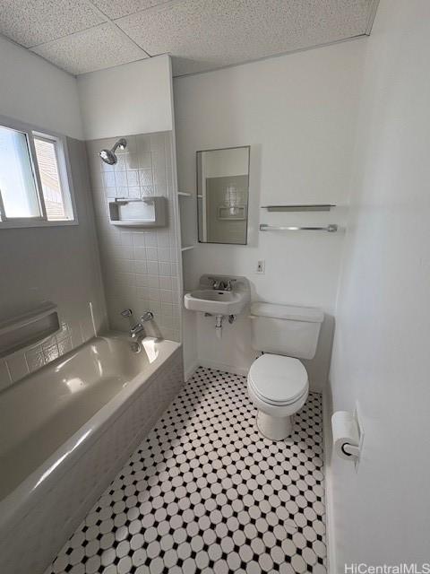 1704 Kamamalu Ave, Honolulu, HI 96813 - bathroom featuring toilet and shower / bathtub combination