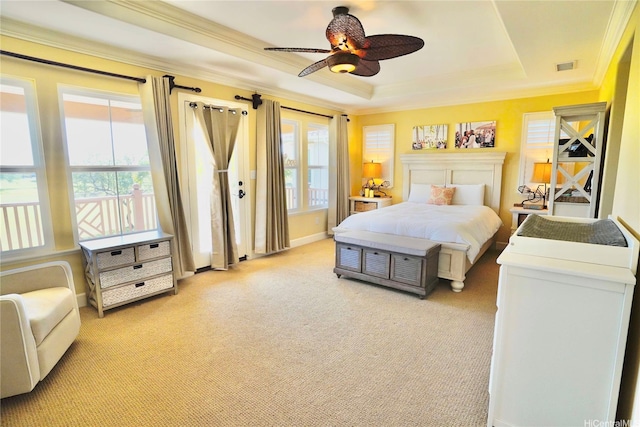 91-1103 Waikai St, Ewa Beach, HI 96706 - bedroom featuring a tray ceiling, ornamental molding, multiple windows, light colored carpet, and access to outside