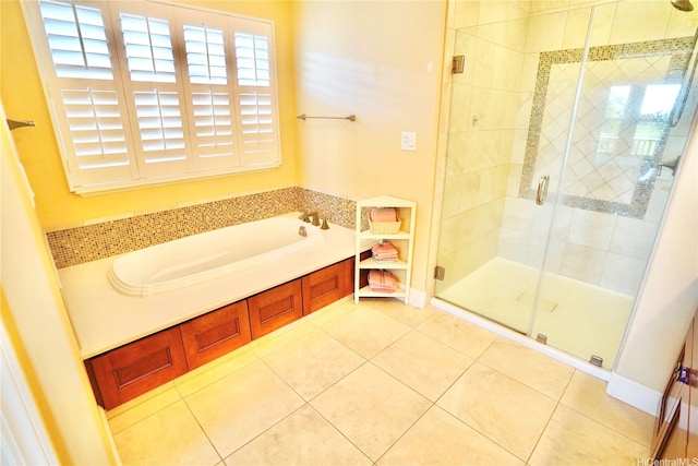 91-1103 Waikai St, Ewa Beach, HI 96706 - full bath with a shower stall, tile patterned flooring, and a garden tub